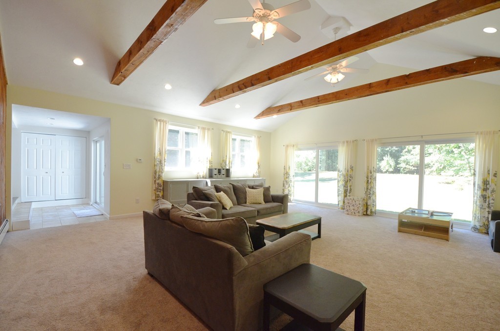 335 Littleton Road Harvard, MA 01451 - Photo 8 of 24 a living room with furniture and a large window