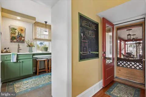 a view of an entryway and livingroom