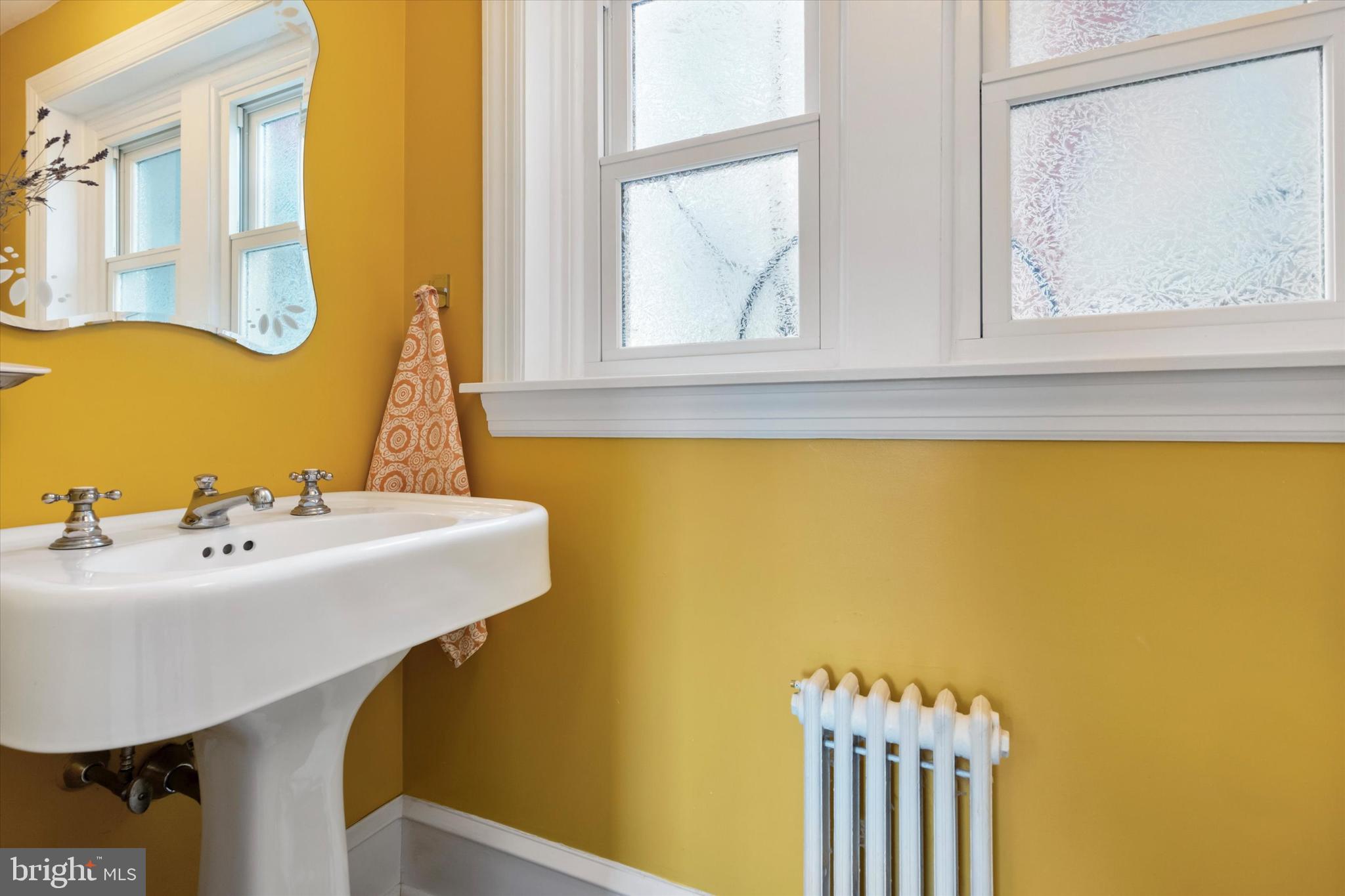 75 Morris Road Harleysville, PA 19438 - Photo 18 of 64 a bathroom with a sink and a mirror