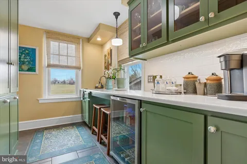 a bathroom with a sink and a window