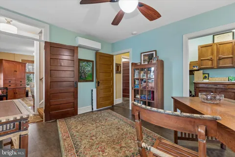 a view of front door and bedroom