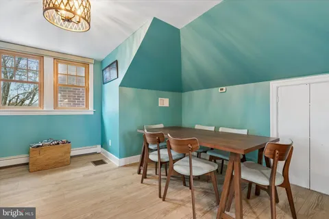 a kitchen with stainless steel appliances a stove and cabinets
