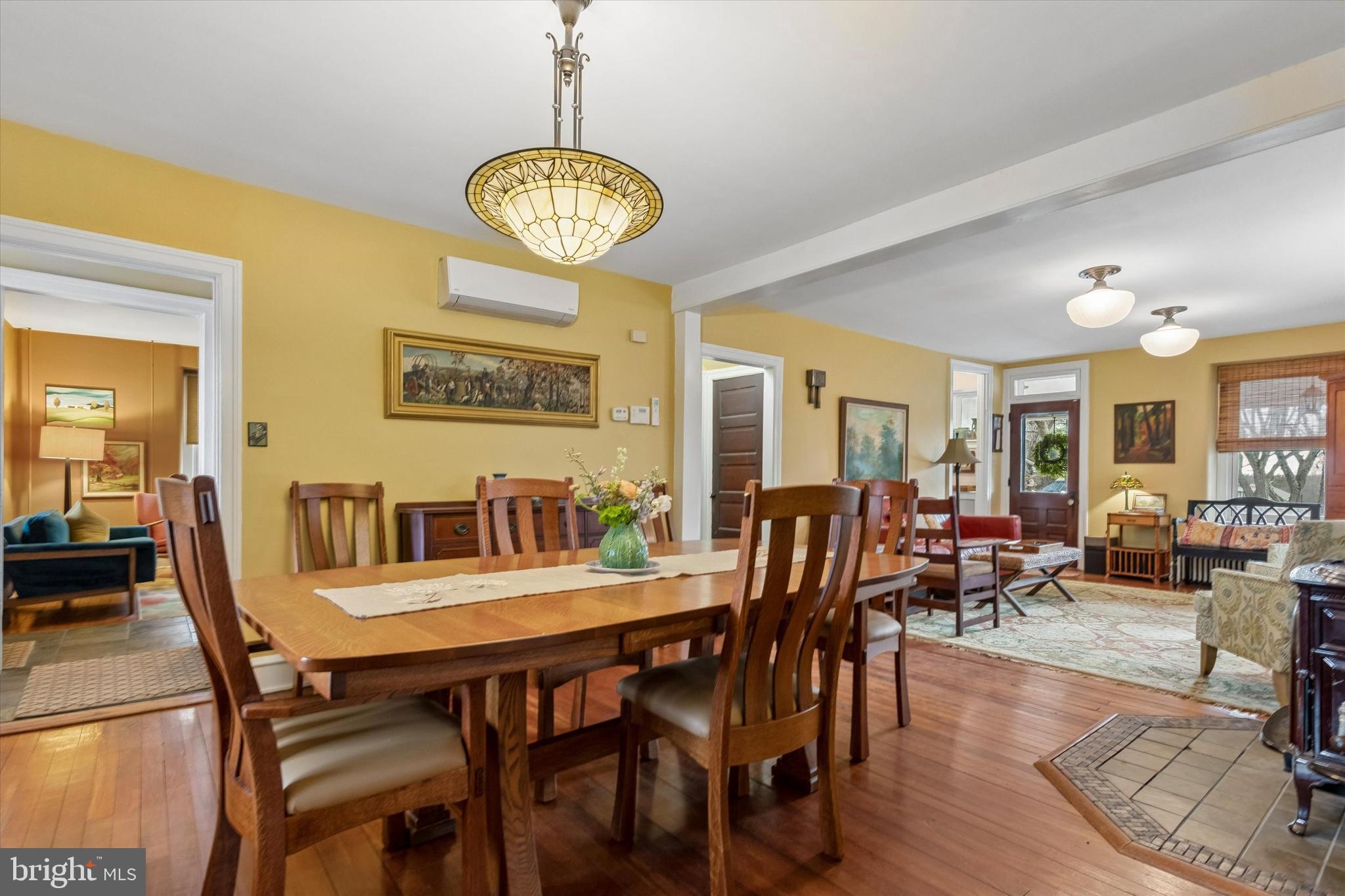 75 Morris Road Harleysville, PA 19438 - Photo 8 of 64 a view of a dining room with furniture wooden floor and chandelier