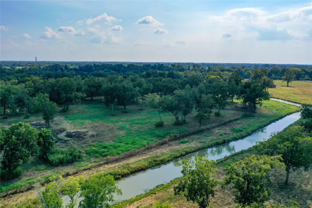 a view of a lake with a city