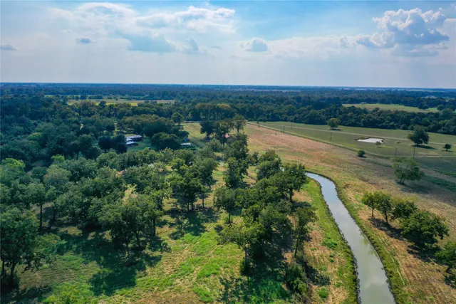 a view of a lake in middle of the town