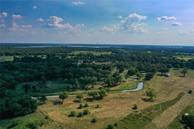 an aerial view of residential house with outdoor space