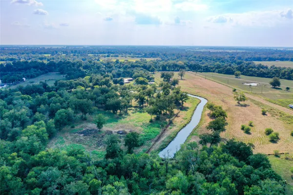 a view of a lake with a city