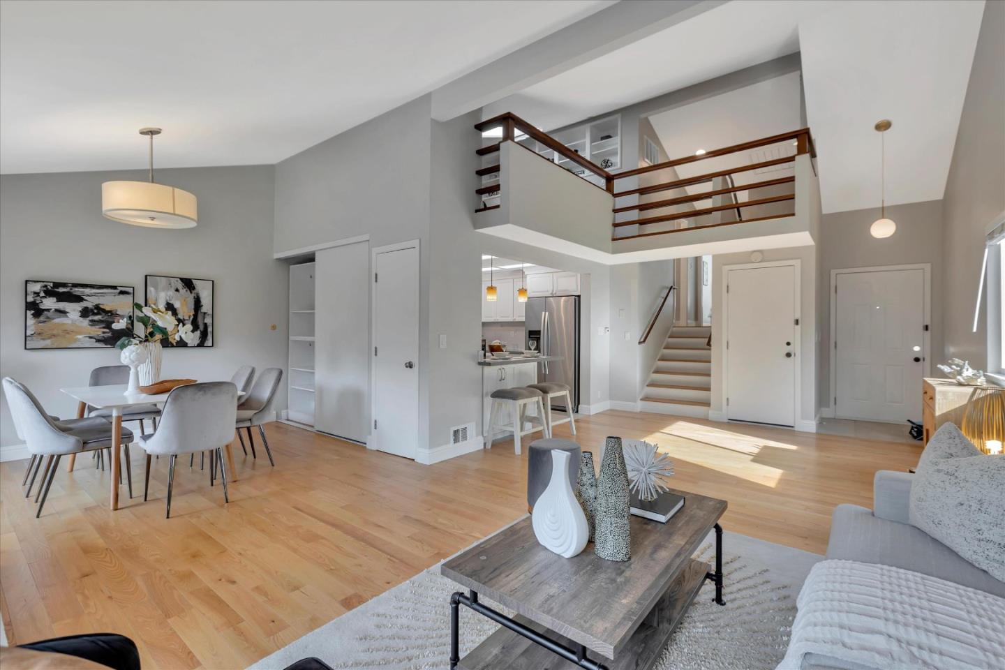 10961 Northsky Square Cupertino, CA 95014 - Photo 1 of 50 a living room with furniture and wooden floor
