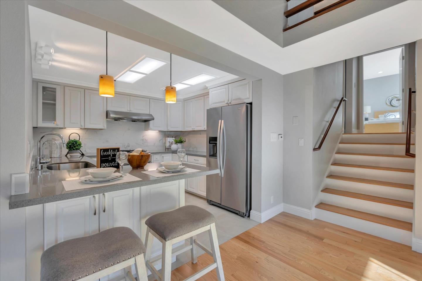 10961 Northsky Square Cupertino, CA 95014 - Photo 13 of 50 a kitchen with a sink cabinets and window