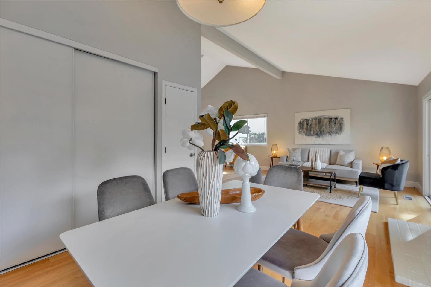 10961 Northsky Square Cupertino, CA 95014 - Photo 17 of 50 a view of a dining room with a table and chairs