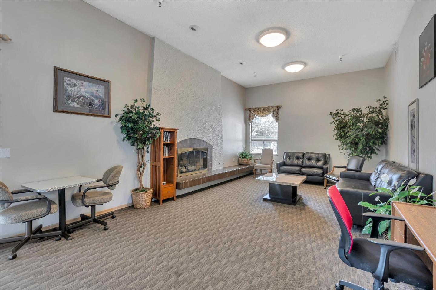 10961 Northsky Square Cupertino, CA 95014 - Photo 26 of 50 a living room with furniture and a potted plant