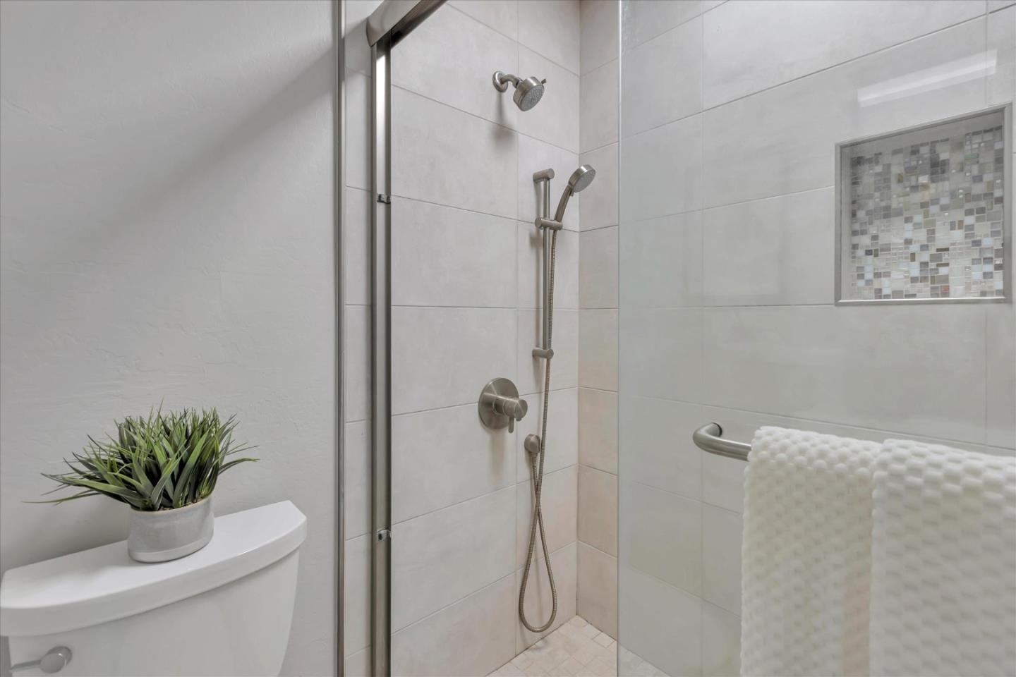 10961 Northsky Square Cupertino, CA 95014 - Photo 29 of 50 a bathroom with a shower a toilet and a sink