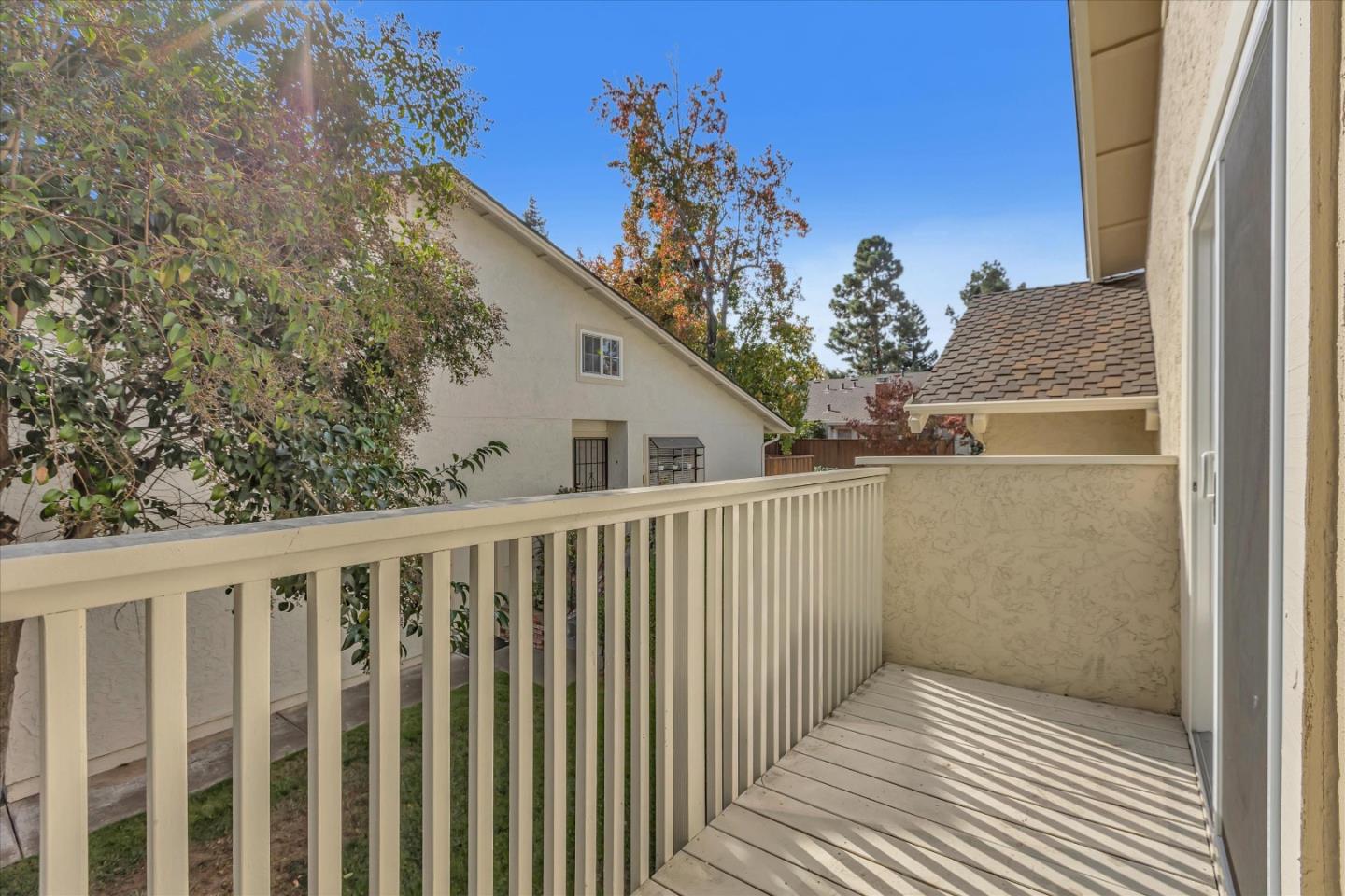 10961 Northsky Square Cupertino, CA 95014 - Photo 32 of 50 a view of a wooden deck and a backyard