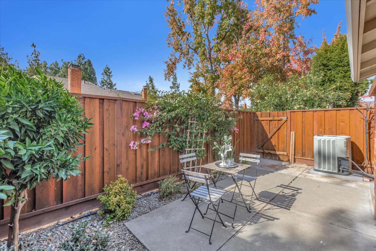 10961 Northsky Square Cupertino, CA 95014 - Photo 34 of 50 a view of backyard with a table and chairs in patio