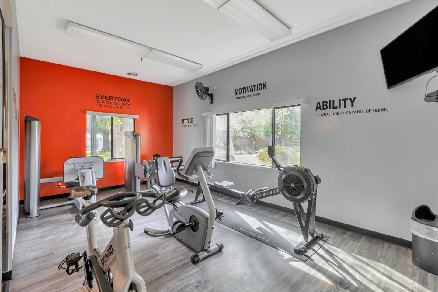10961 Northsky Square Cupertino, CA 95014 - Photo 38 of 50 a room with gym equipment and windows