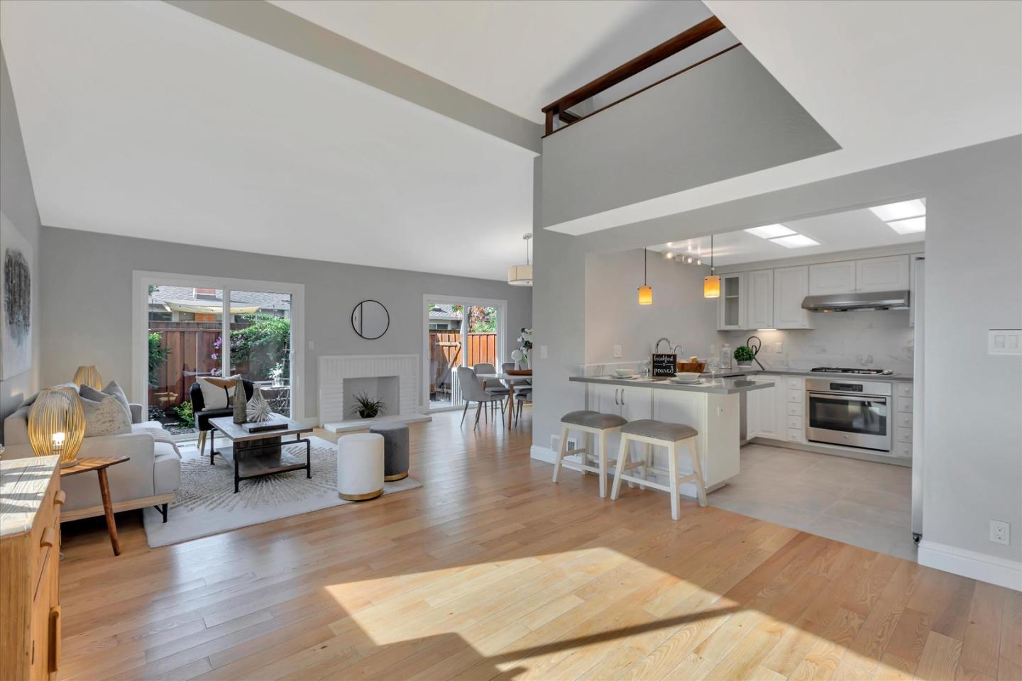10961 Northsky Square Cupertino, CA 95014 - Photo 5 of 50 a living room with furniture dining table and wooden floor