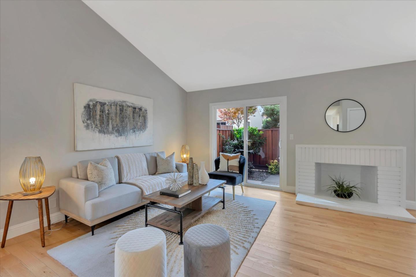 10961 Northsky Square Cupertino, CA 95014 - Photo 6 of 50 a living room with furniture and a fireplace