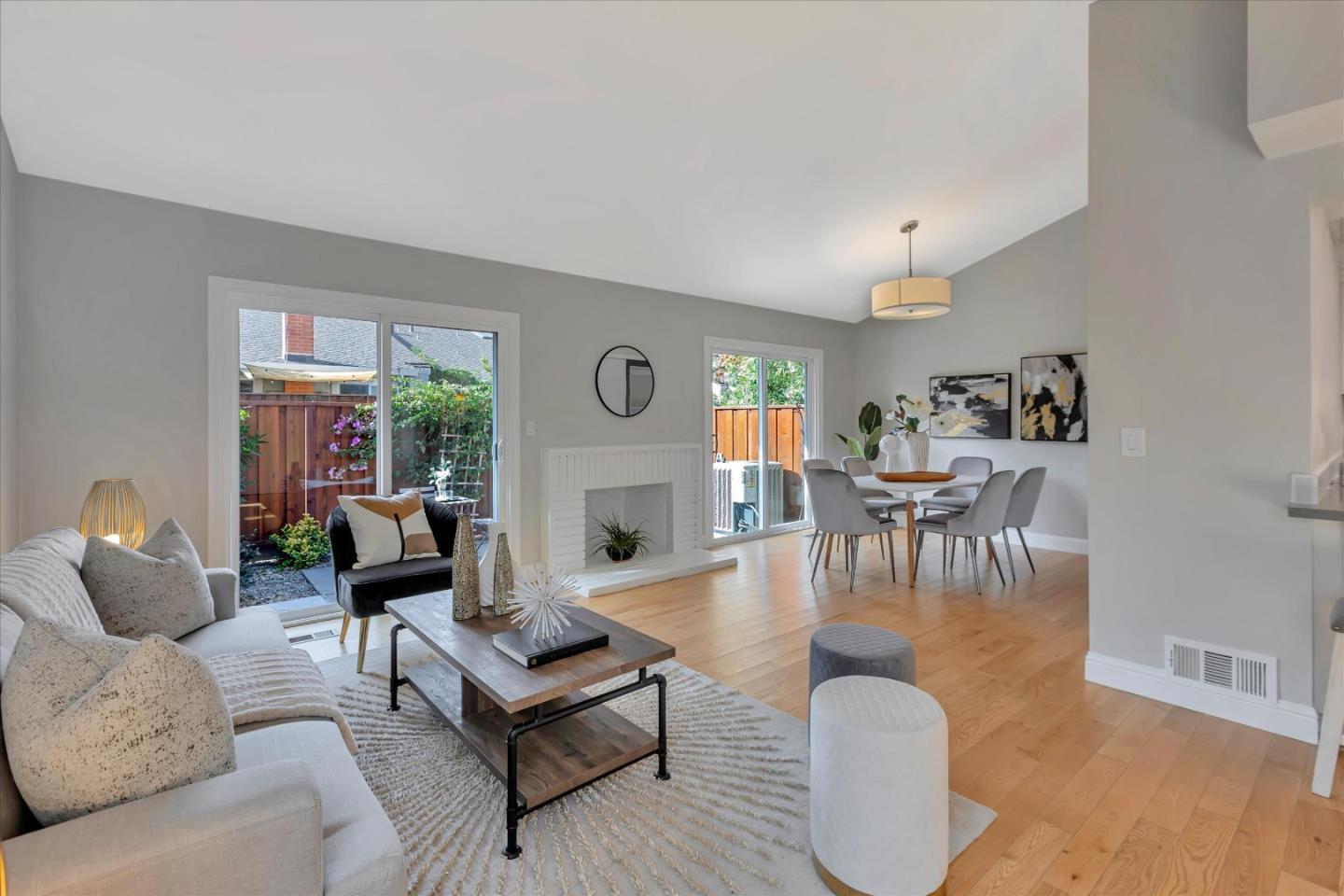 10961 Northsky Square Cupertino, CA 95014 - Photo 7 of 50 a living room with furniture and a large window