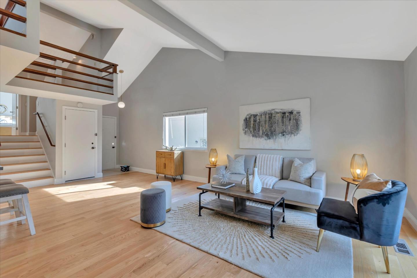 10961 Northsky Square Cupertino, CA 95014 - Photo 8 of 50 a living room with furniture a rug and a window
