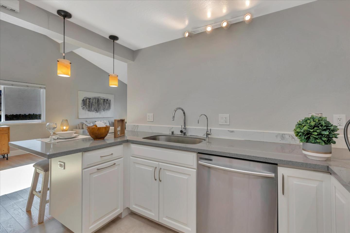 10961 Northsky Square Cupertino, CA 95014 - Photo 10 of 50 a kitchen with sink and cabinets