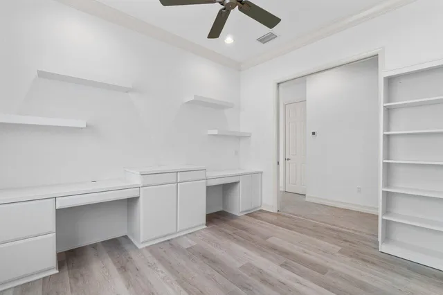 a view of an empty walk in closet