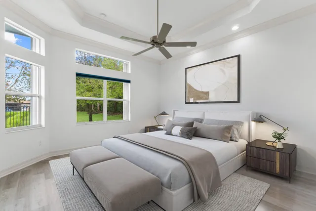 a bedroom with bed and window