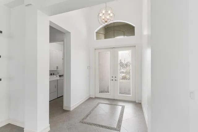 a view of entryway with chandelier