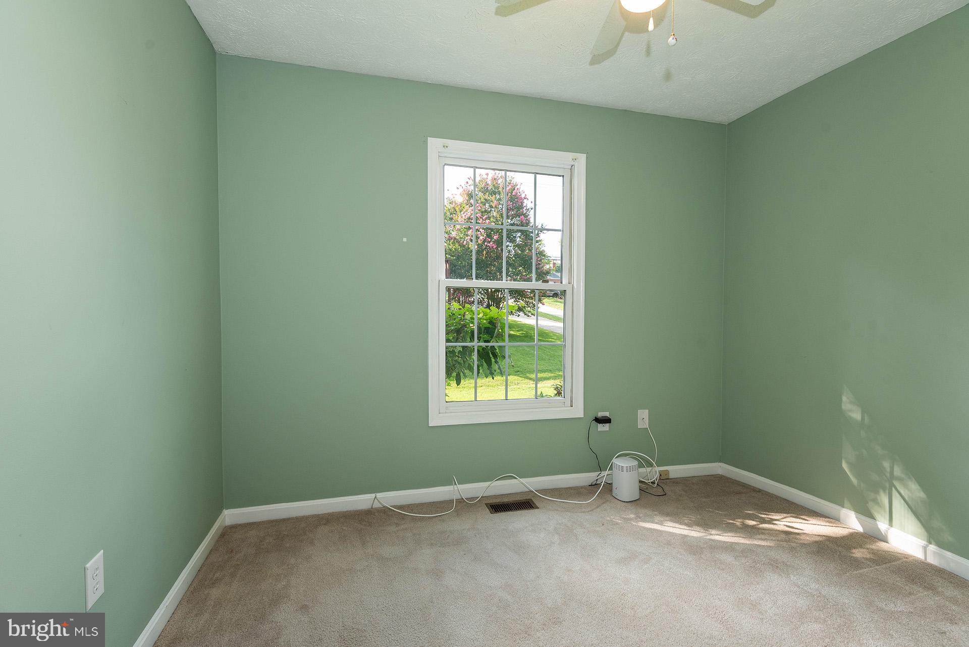 7523 Harmans Road Harmans, MD 21077 - Photo 13 of 27 a view of an empty room with a window