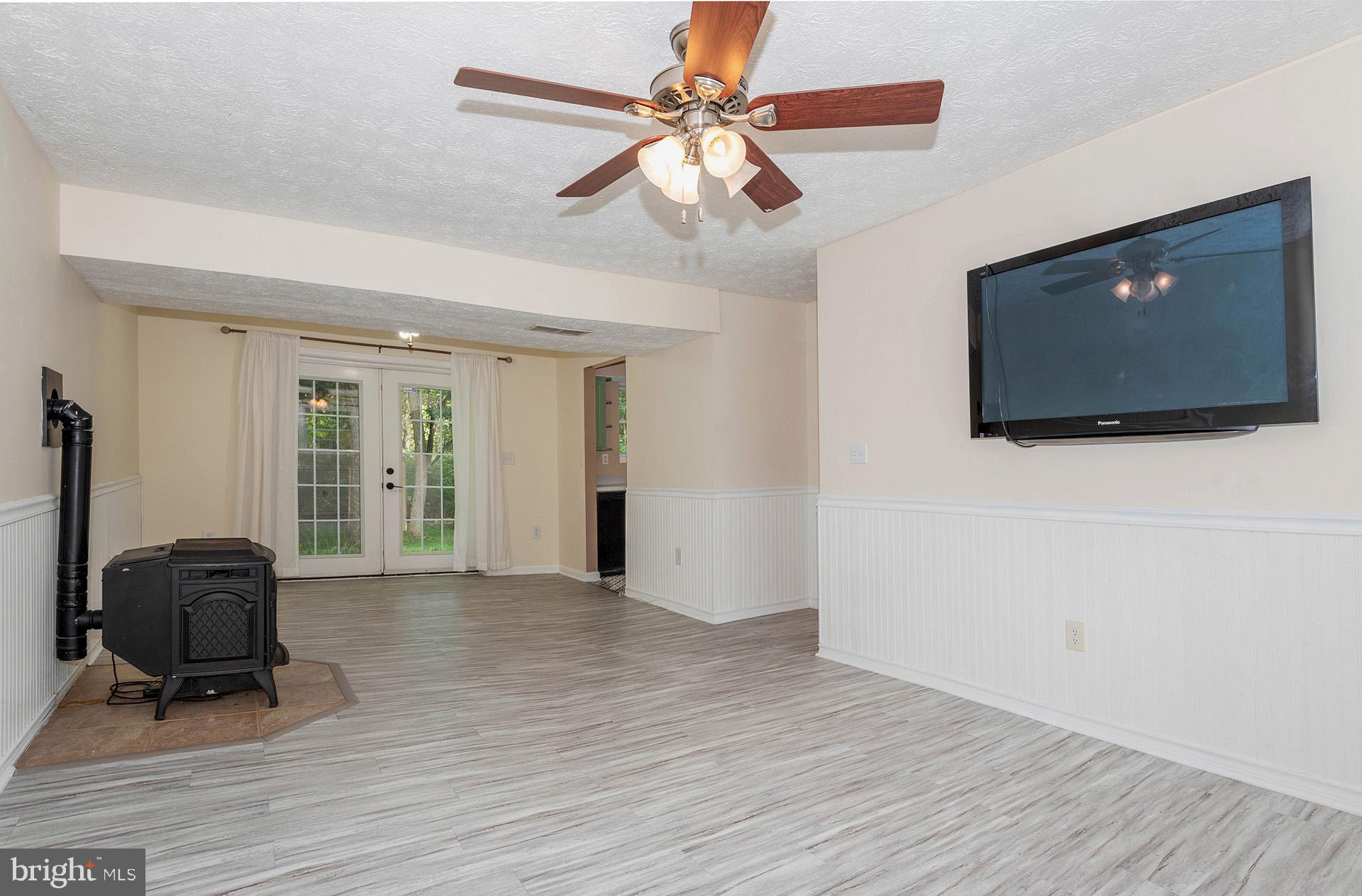 7523 Harmans Road Harmans, MD 21077 - Photo 16 of 27 a view of workspace with wooden floor and gym equipment