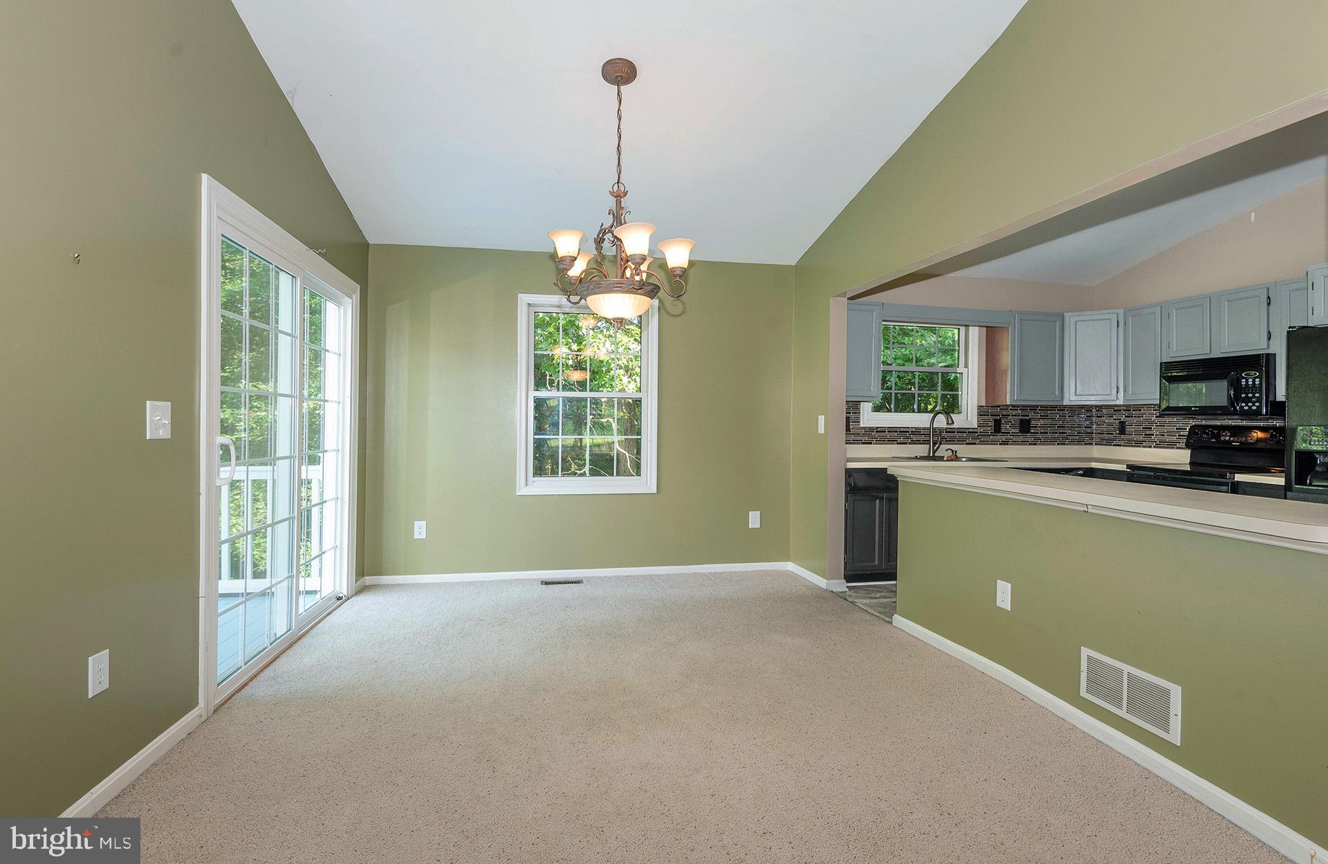 7523 Harmans Road Harmans, MD 21077 - Photo 6 of 27 a open kitchen with window and cabinets