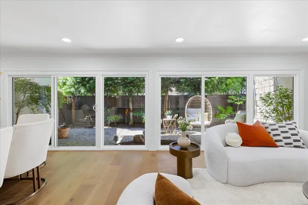 a outdoor space with lots of furniture and shower