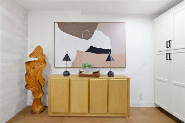 a bedroom with two beds and a couch