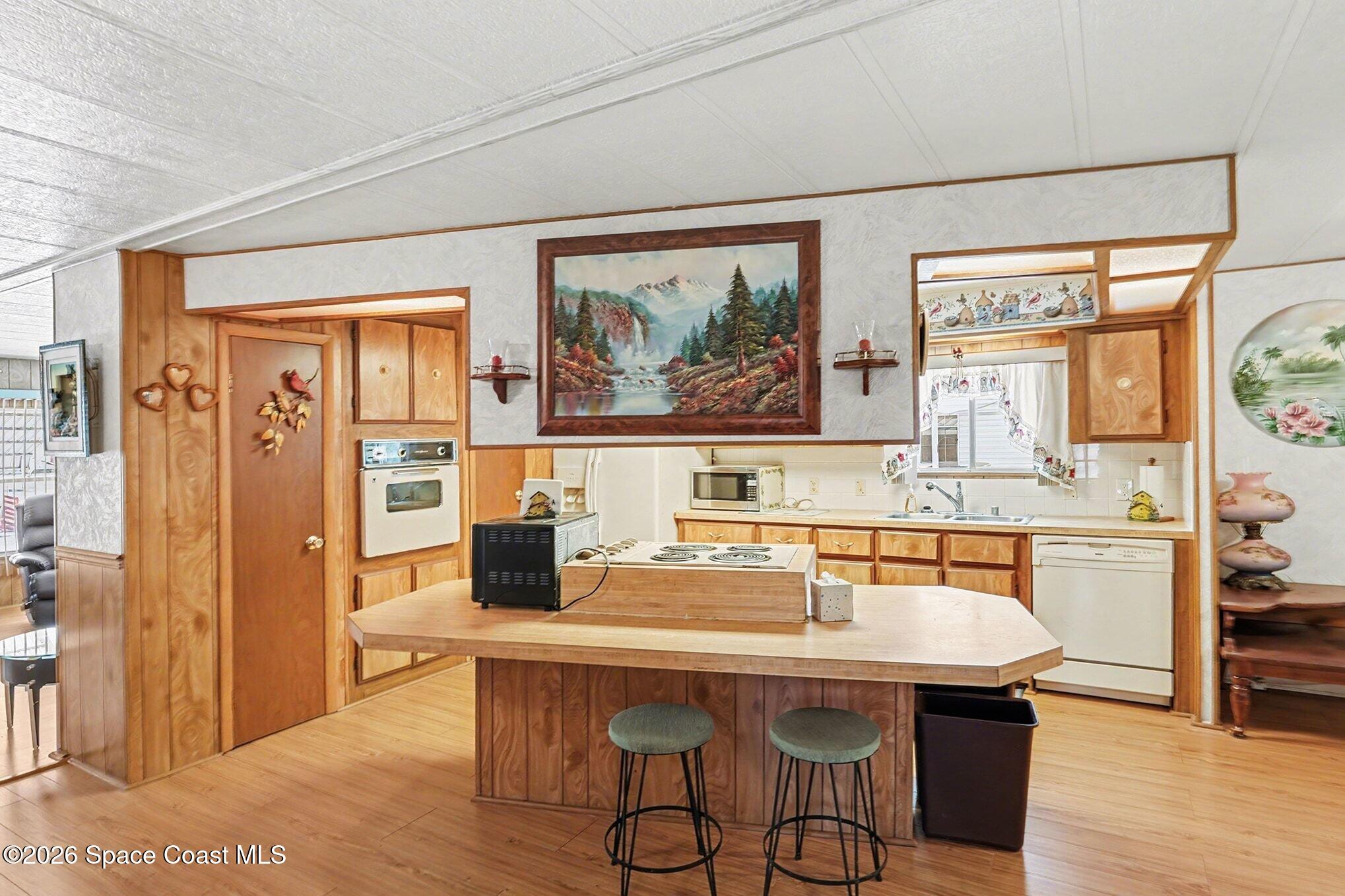 1740 Coco Plum Street Northeast Palm Bay, FL 32905 - Photo 12 of 33 a dining room with a table and chairs