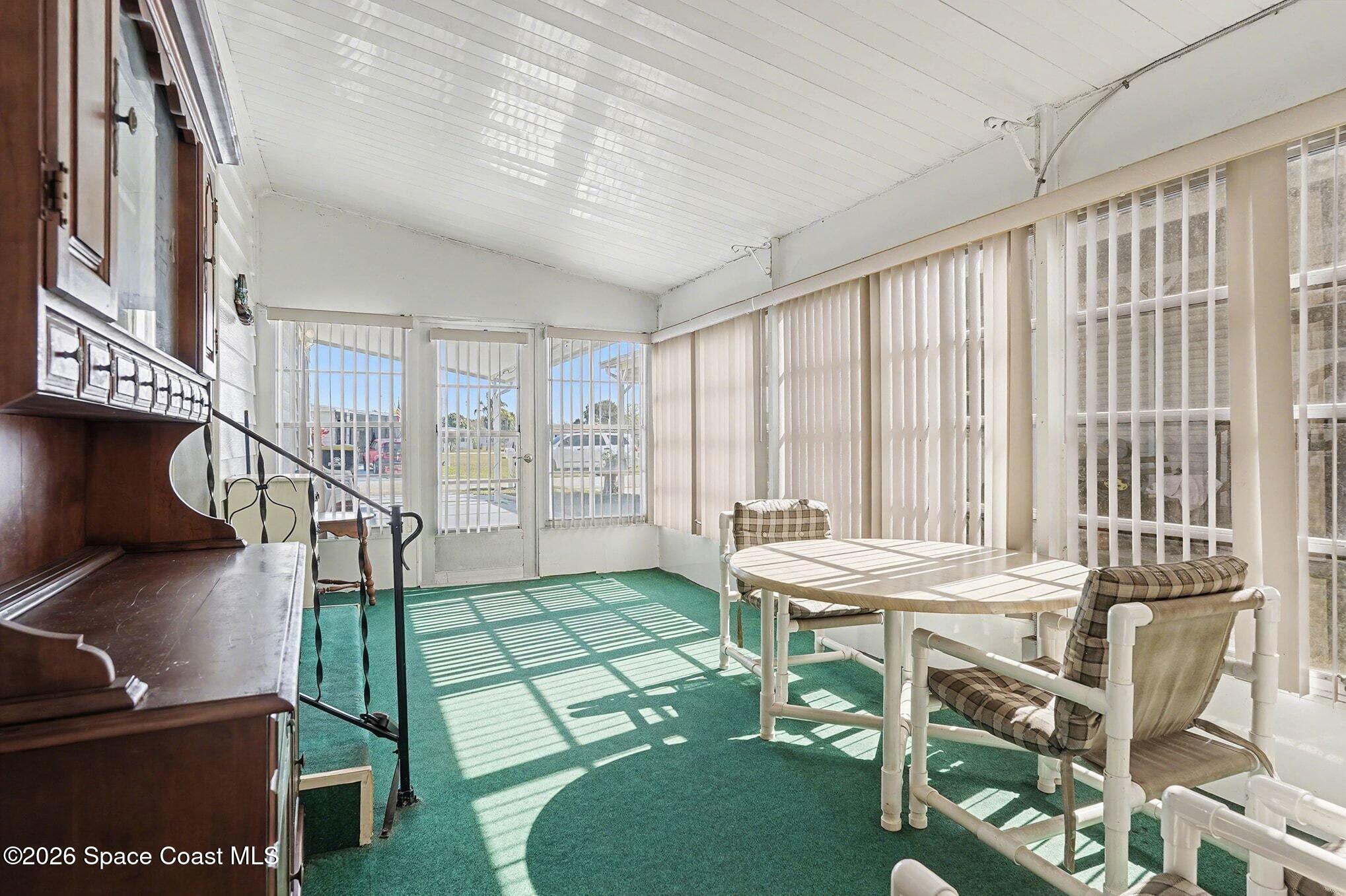 1740 Coco Plum Street Northeast Palm Bay, FL 32905 - Photo 17 of 33 a view of a livingroom with furniture