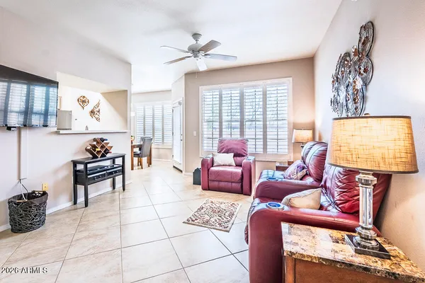 a living room with furniture and a window