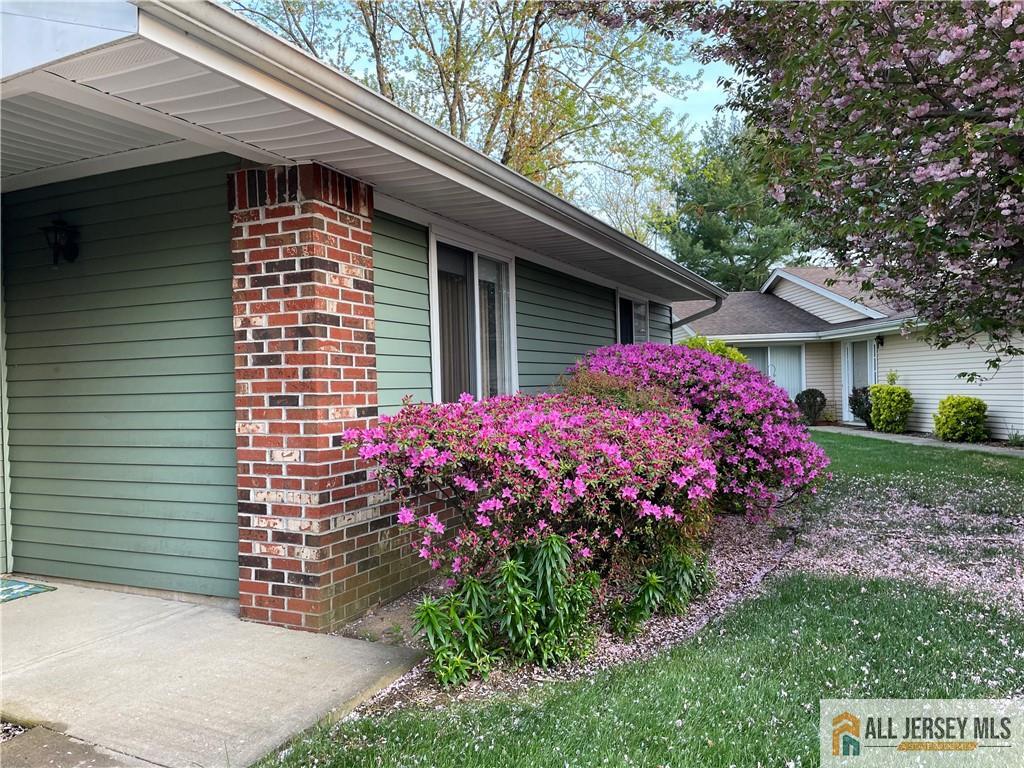 460A Delair Road, Unit A Monroe Township, NJ 08831 - Photo 2 of 29 a front view of a house with garden