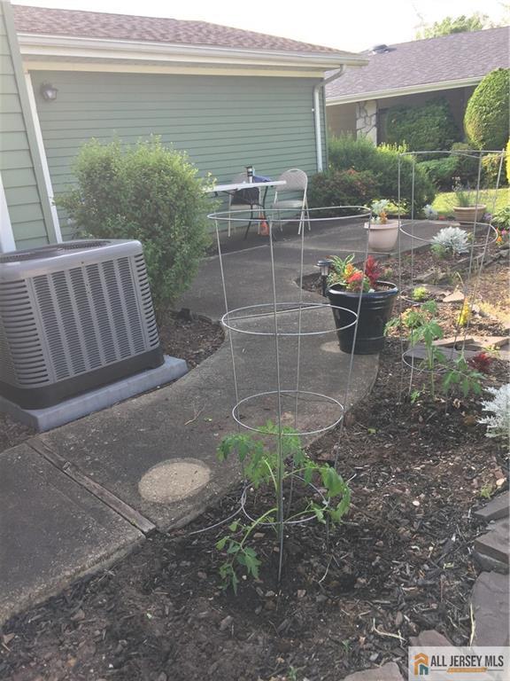 460A Delair Road, Unit A Monroe Township, NJ 08831 - Photo 25 of 29 a view of a backyard with sitting area
