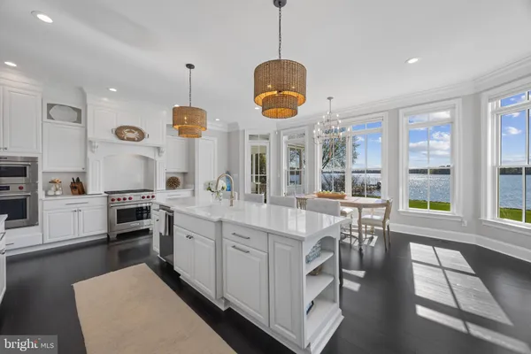 a very nice looking dining room with a table and chairs