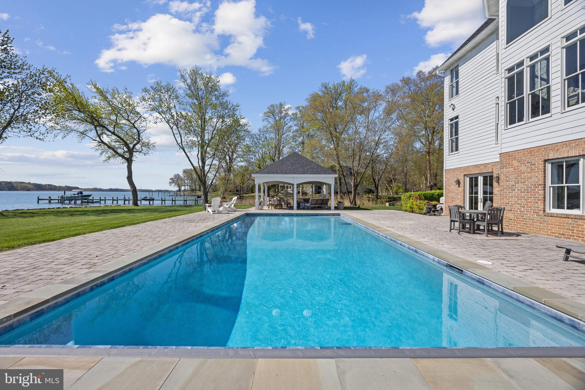 200 Wye Road Queenstown, MD 21658 - Photo 32 of 71 Pebble finish pool with auto cover