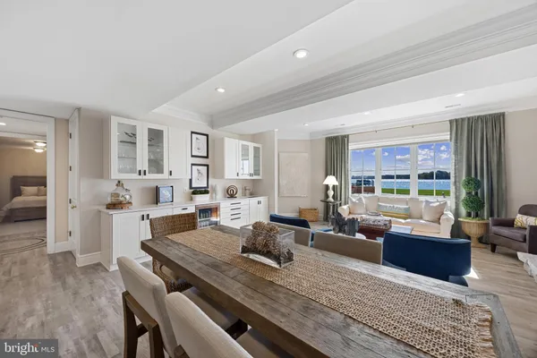 a view of a house with backyard outdoor seating and entertaining space