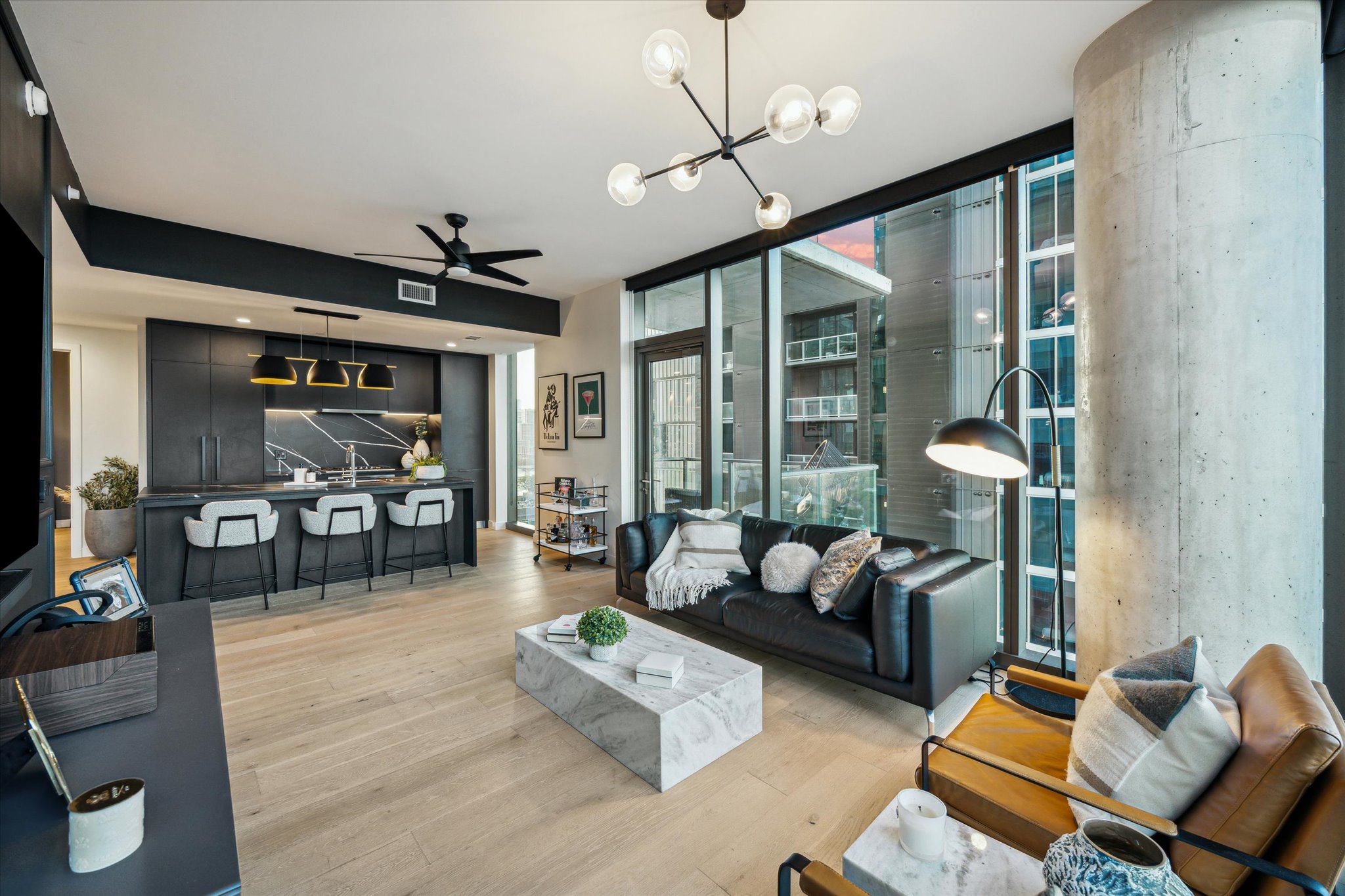 44 East Avenue, Unit 1607 Austin, TX 78701 - Photo 6 of 19 a living room with furniture and a large window