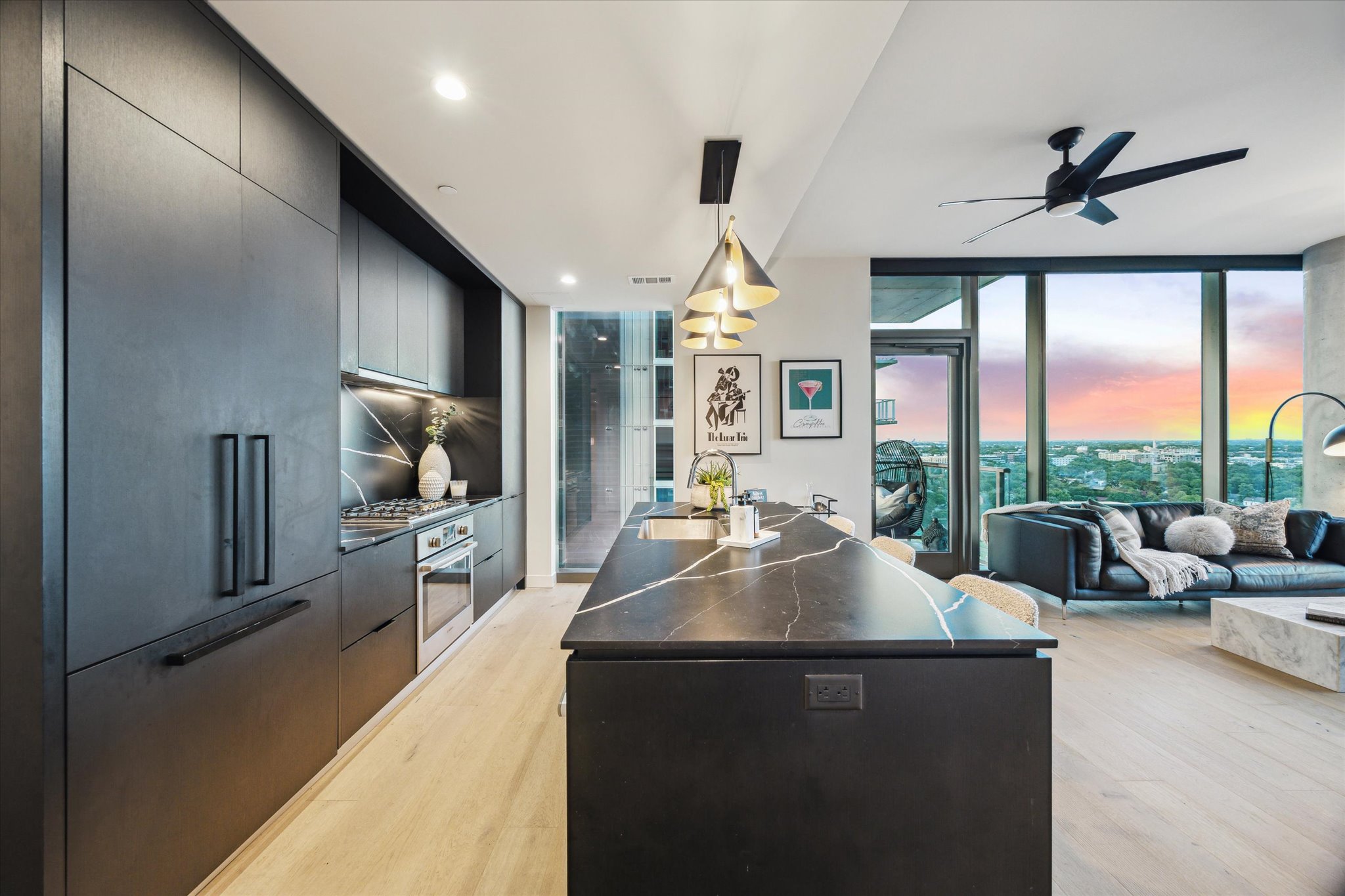 44 East Avenue, Unit 1607 Austin, TX 78701 - Photo 8 of 19 a living room with furniture and a large window