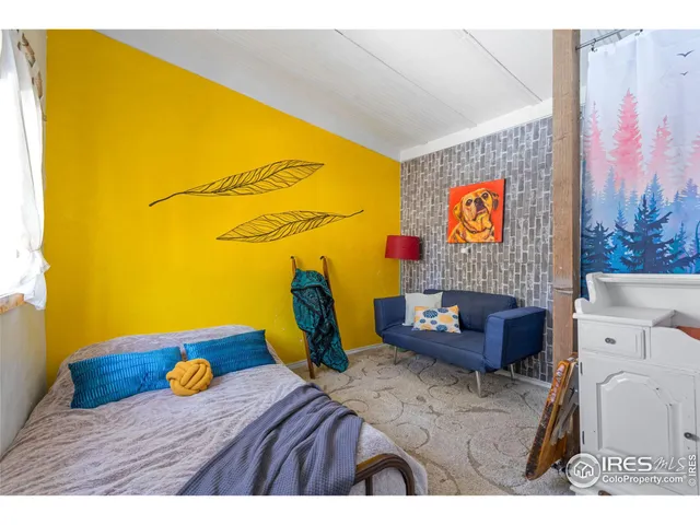 a room with furniture and a flat screen tv