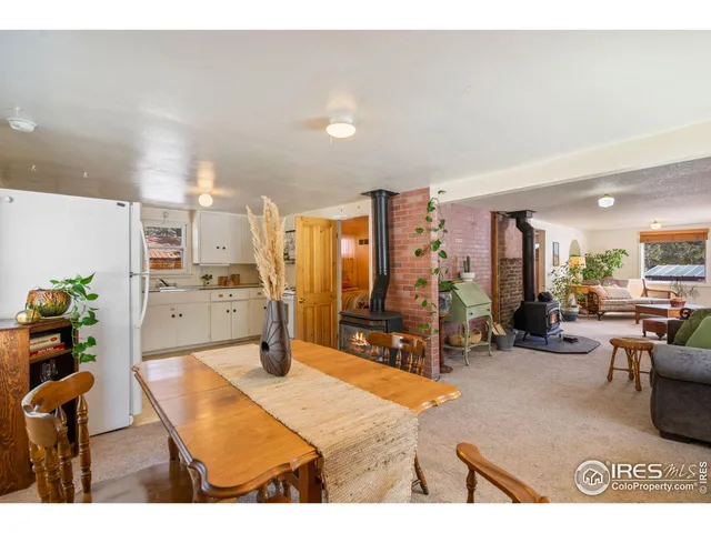 a living room with lots of furniture and appliances