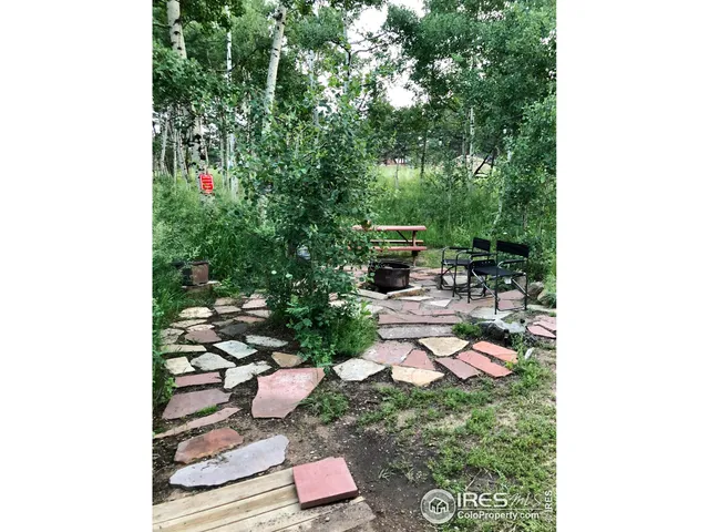 a front view of a house with yard