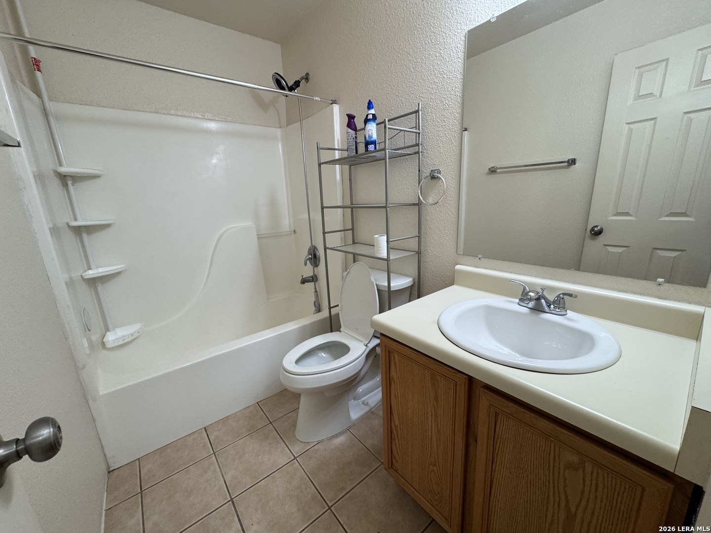 7921 M G Road San Antonio, TX 78251 - Photo 5 of 10 a bathroom with a sink a toilet and a shower