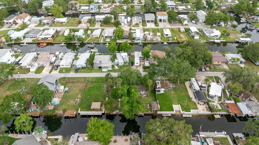 5323 Circle Drive Weeki Wachee, FL 34607 - Photo 34 of 77 an aerial view of residential houses with outdoor space and street view