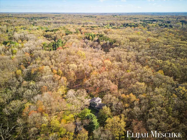 $649,900 | 9000 Crooked Crow Road Northeast, Ada, MI 49301