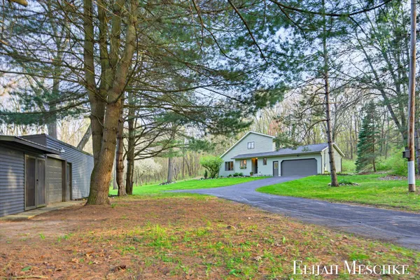 $649,900 | 9000 Crooked Crow Road Northeast, Ada, MI 49301