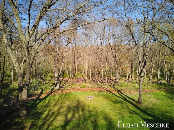 $649,900 | 9000 Crooked Crow Road Northeast, Ada, MI 49301